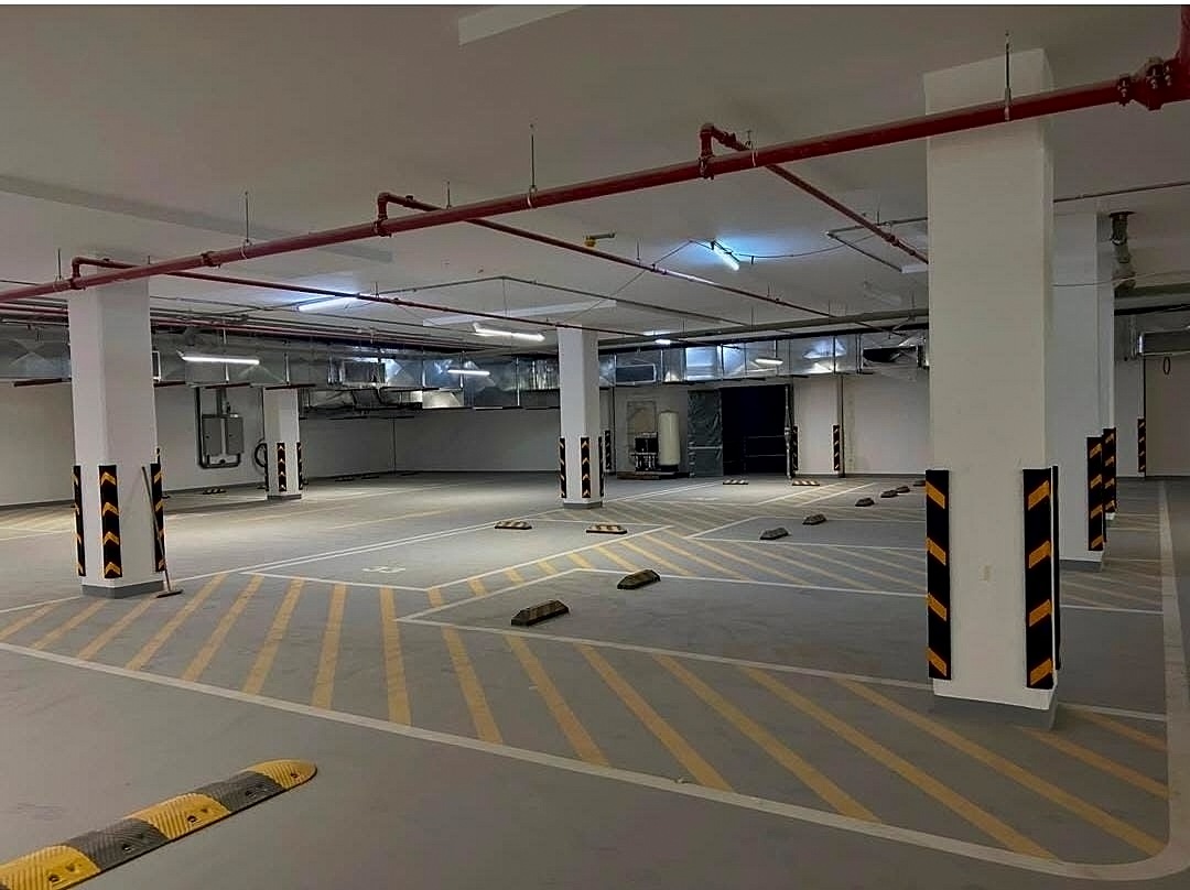 Basement car park floor coating with yellow line marking in Bahrain